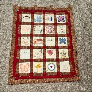 Handmade Patchwork Quilt with Red and Brown Accents